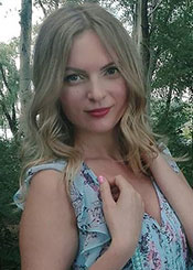 Elena, (34), de Europa del Este es soltera